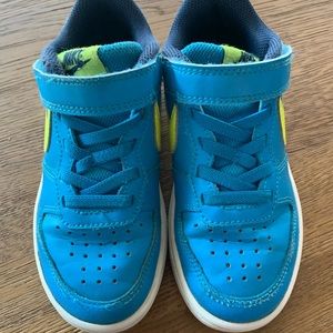 Nike Kids Court Borough Low Blue / Teal with yellow swoosh.